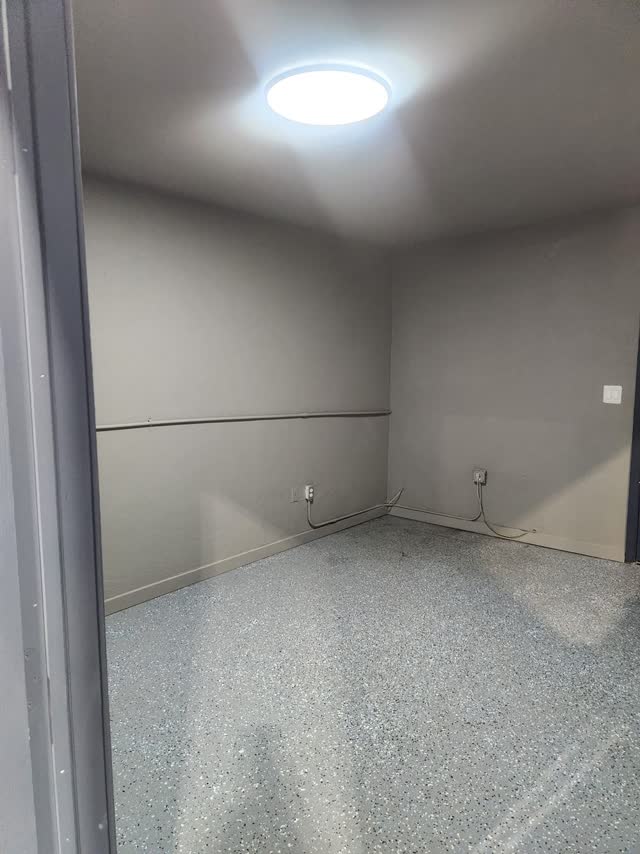 Enclosed room with LED light and epoxy floor